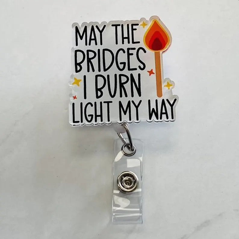 “May the Bridges I Burn Light My Way” Badge Reel – Funny Motivational ID Holder
