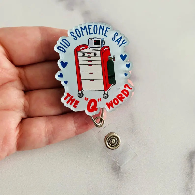 “Did Someone Say the ‘Q’ Word?” Badge Reel – Funny Healthcare Retractable ID Holder