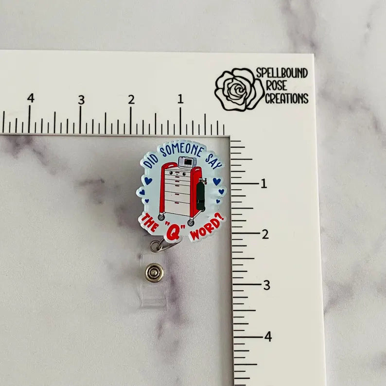 “Did Someone Say the ‘Q’ Word?” Badge Reel – Funny Healthcare Retractable ID Holder