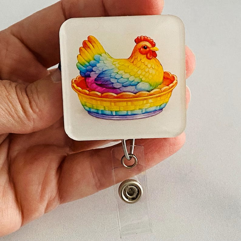 Rainbow Hen in Dish Badge Reel – Colorful Farm Animal ID Holder