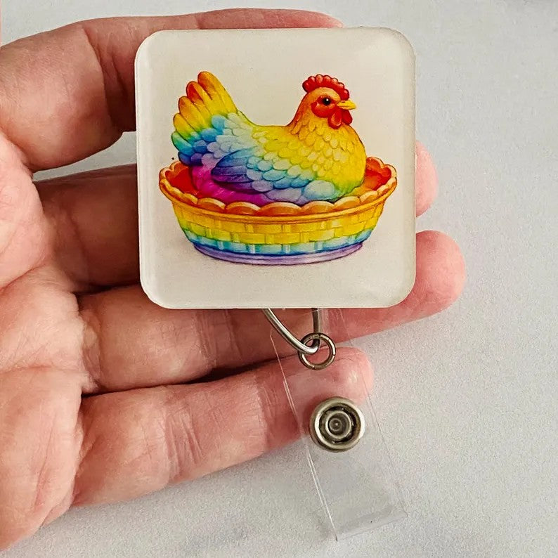 Rainbow Hen in Dish Badge Reel – Colorful Farm Animal ID Holder