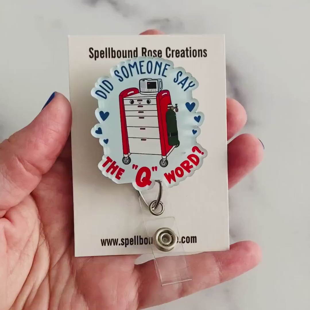 “Did Someone Say the ‘Q’ Word?” Badge Reel – Funny Healthcare Retractable ID Holder