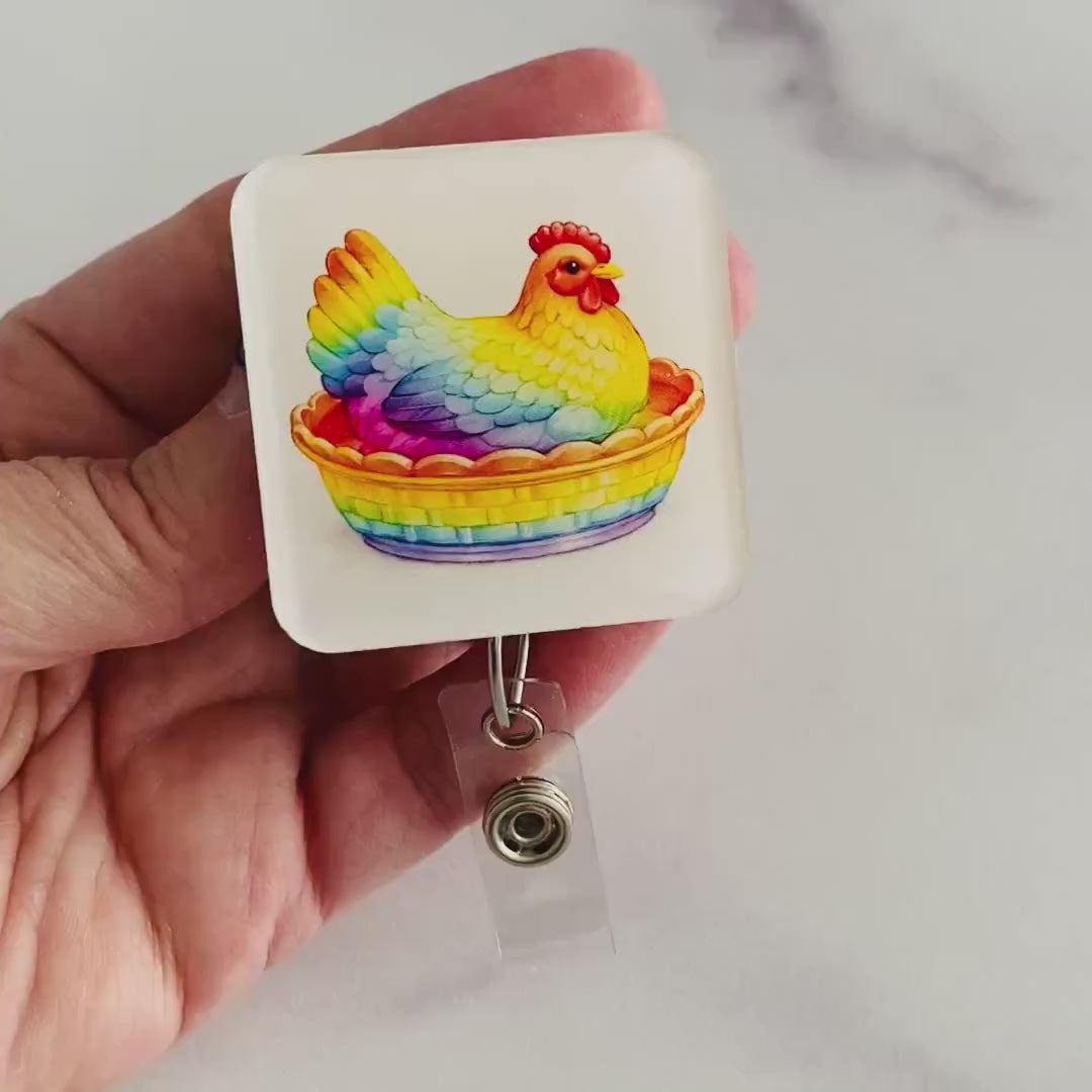 Rainbow Hen in Dish Badge Reel – Colorful Farm Animal ID Holder